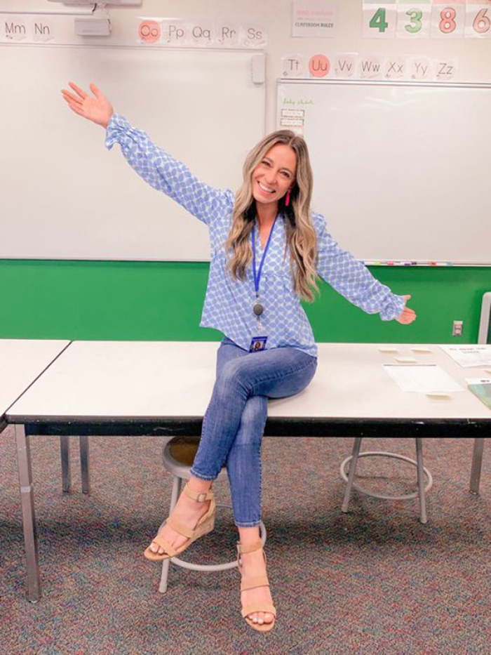 Printed blue top with blue jeans